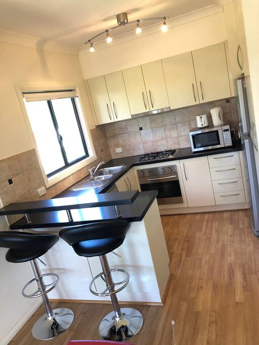 Modern Kitchen with stainless steel appliances