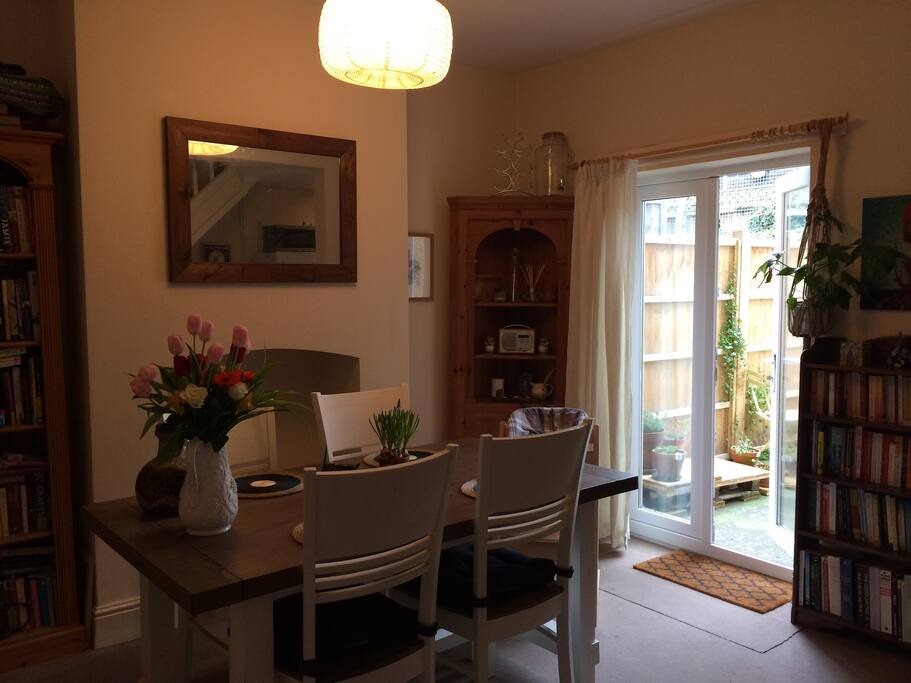 Dining area opening onto garden