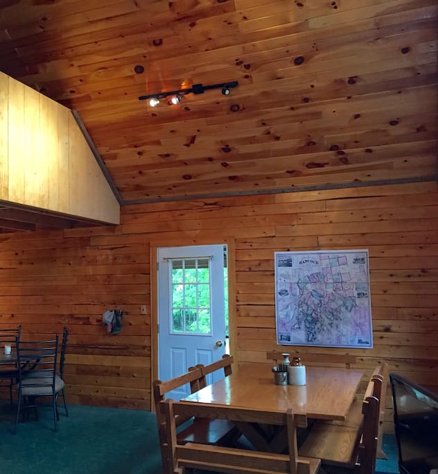 Sleeping loft opens up to dining area.