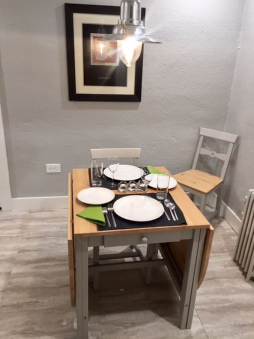 Table expands to seat six in generous size kitchen.