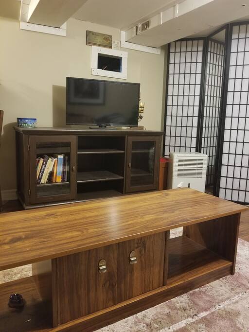 Your home away from home. Enjoy some TV and relax in private. The ceiling is a bit low in some areas.