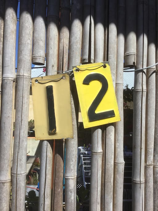 Number near entrance gate to apartment and courtyard