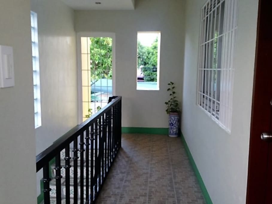 The hallway leading to the apartments. it's quite windy here.
