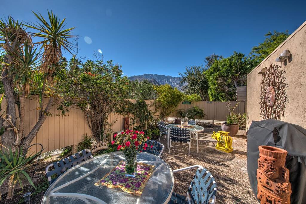 Enclosed patio off dining area with lovely garden and forever views.