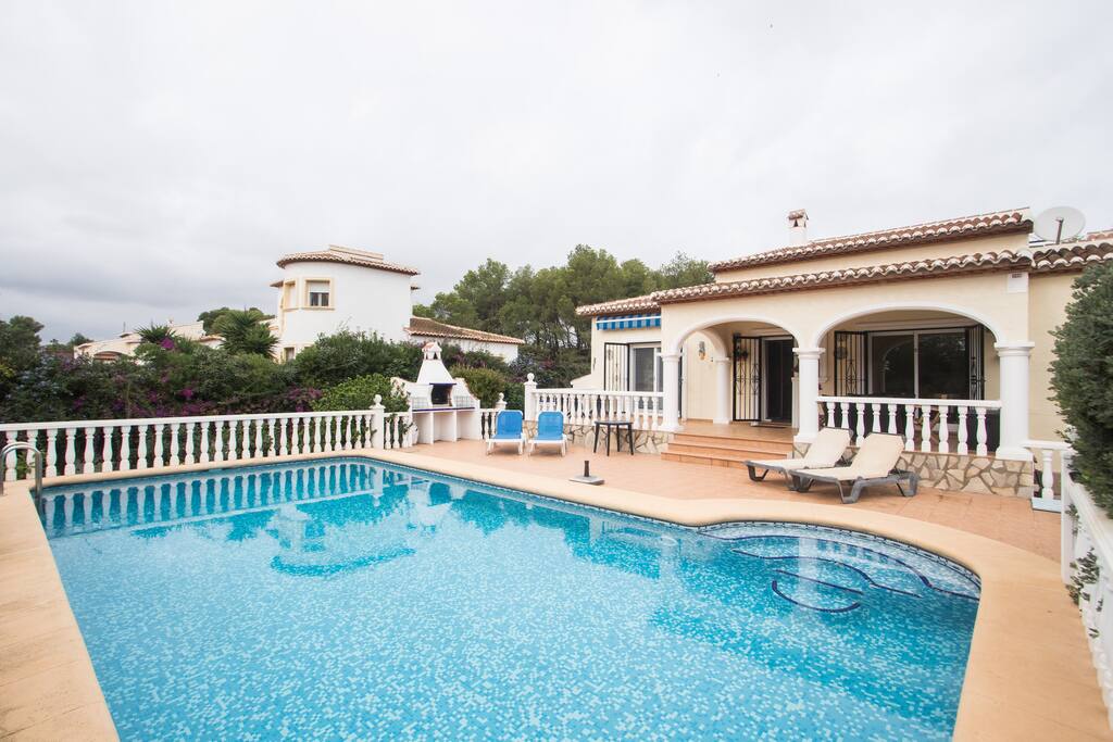 Take a dip in the large swimming pool.