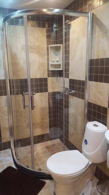 baño con cabina de cristal