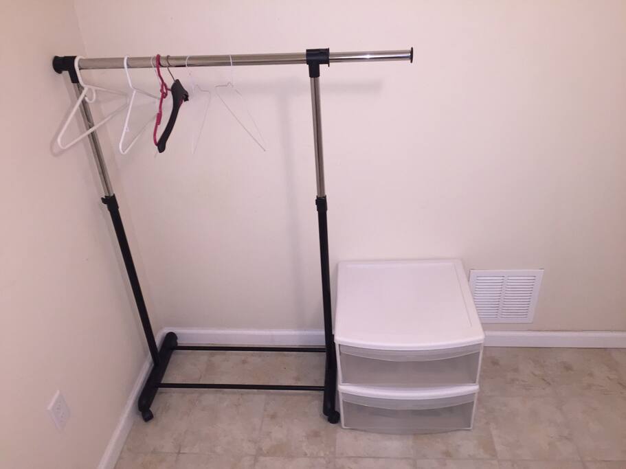 Bedroom: hangars and plastic drawers for your clothes