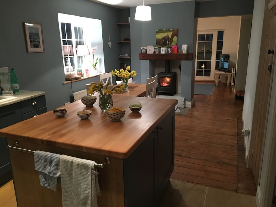 Kitchen, dining table and wood burner