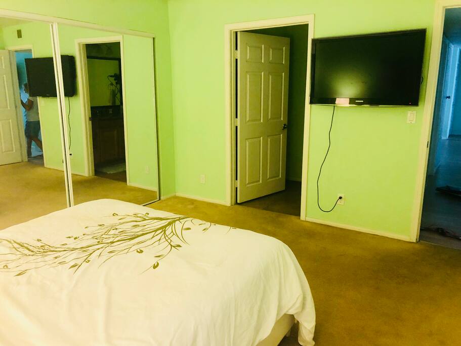 Your Bedroom with 46 inch TV and bathroom opening from your room