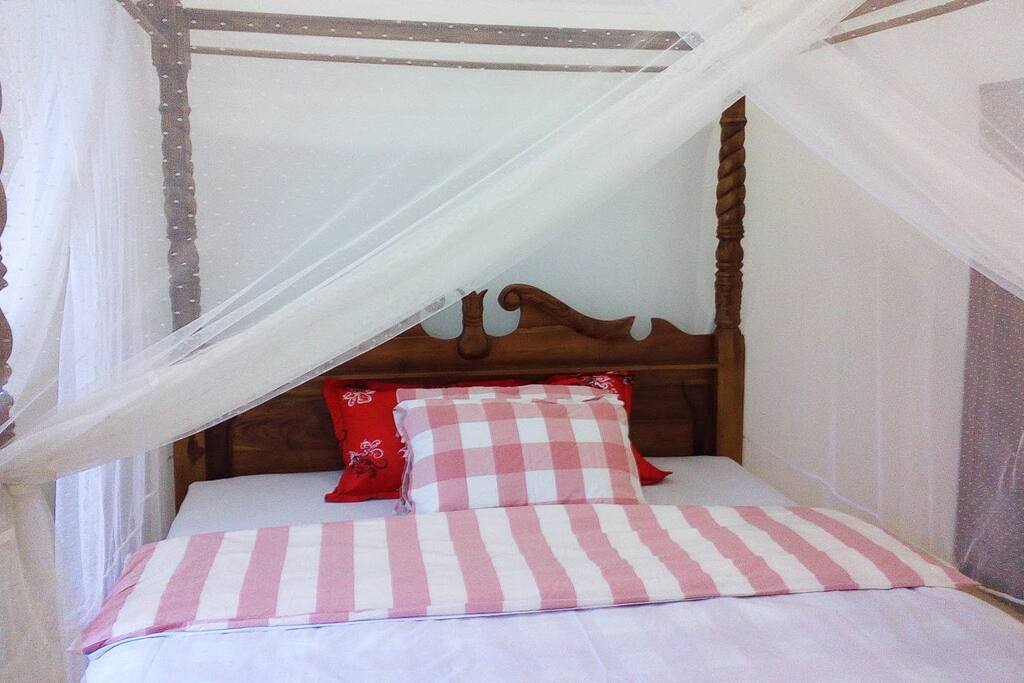 Beautiful romantic bed. mosquito net and Air conditioning.