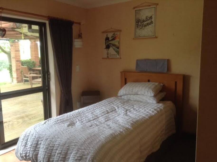 This room has a king single bed which can be made into a super king sized bed. It does take up most of the room when extended. We also have other rooms, see our other listing.