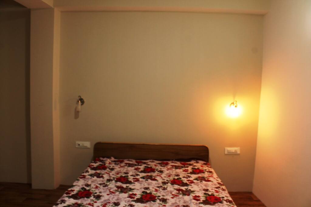 fresh, spacey, clutter free bedroom