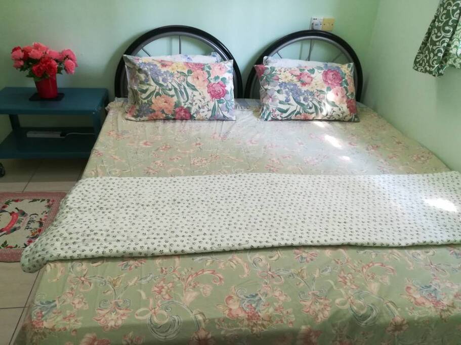Fully furnished air-conditioned room with option to separate single beds upon request. Bathroom attached.