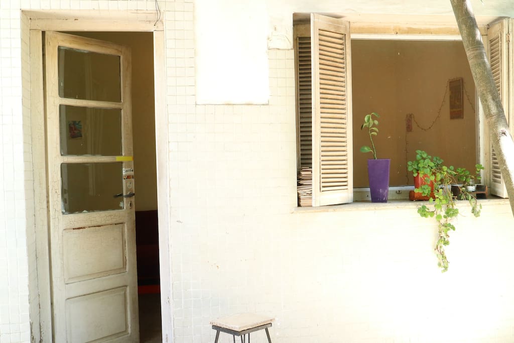 The entrance to the last bedroom it's sorrounded by a little garden with trees