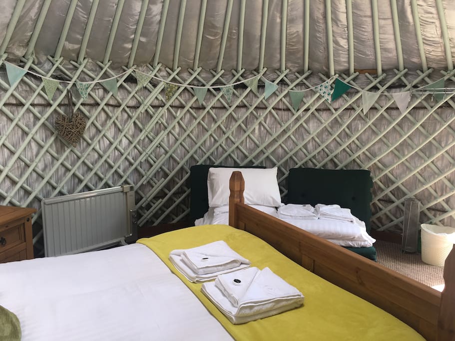 Kind size bed & 2 x single futon beds