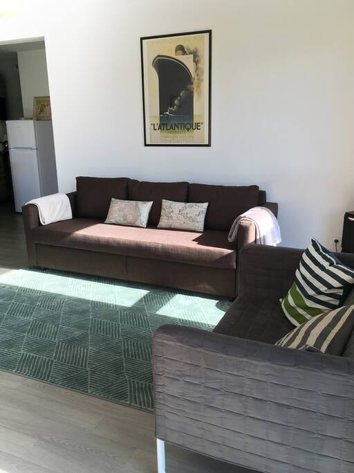 Le salon avec accès terrasse