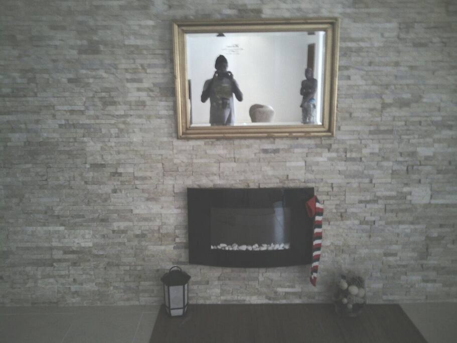 Living room with fireplace !! Turn on the music and fire place - have a romantic night with your love ones!!