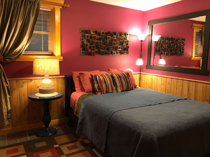 Lower level bedroom with queen bed.