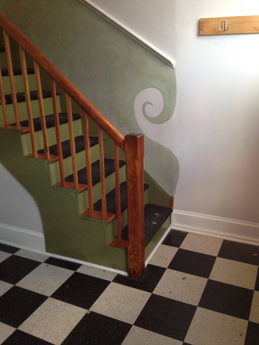 Entrance hall with stairs to living room and kitchen