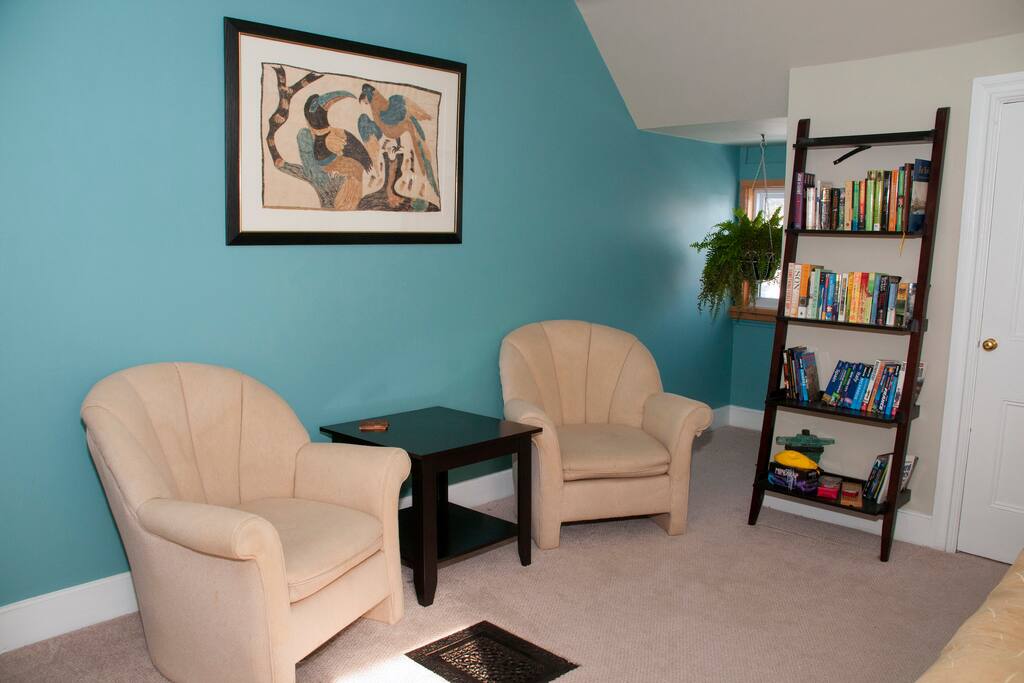 cozy living room with books and games