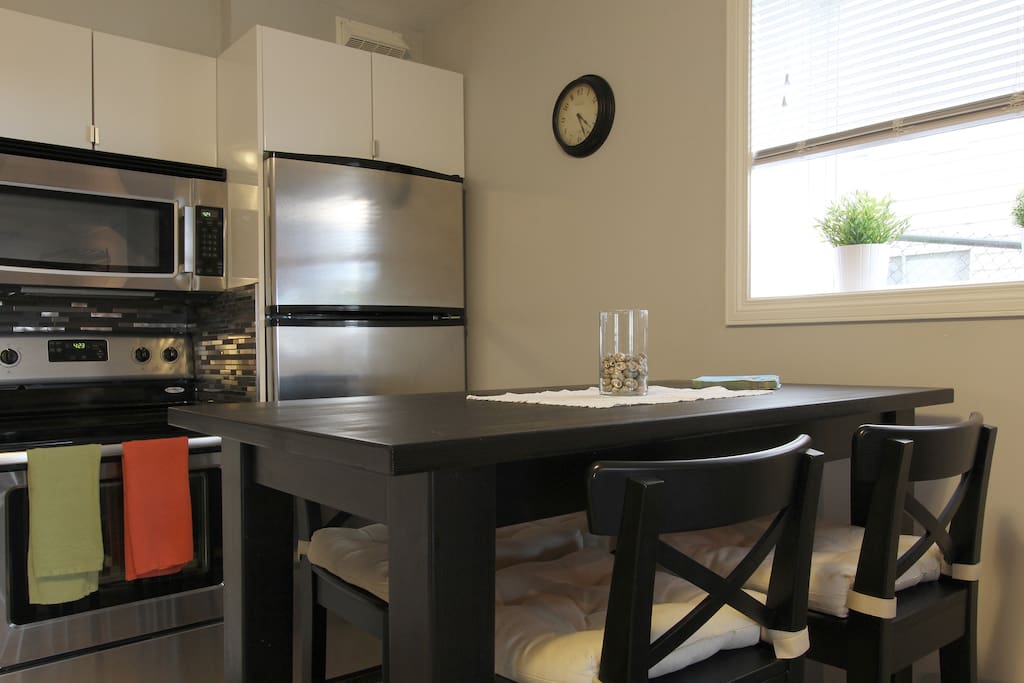 Big window makes the kitchen and the living area bright and cosy.
