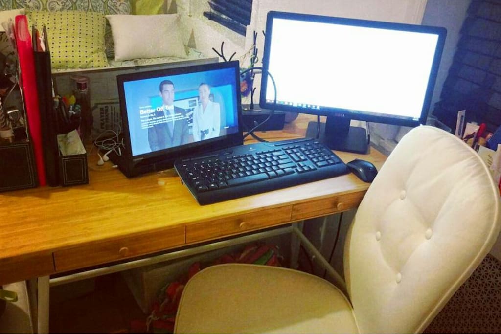 Brand new desk, comfy adjustable office chair, wireless keyboard and mouse, extra monitor with hdmi-dvi cord to make working on your laptop twice as easy with extended display capabilities!