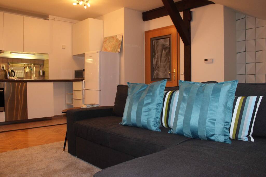 Couch pulls out to make double bed.