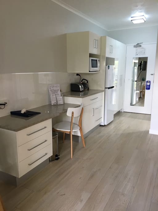 New cabinetry. Plenty of storage space and all the small appliances you'll need to enjoy your stay. Glasses, cups, bowls, and plates provided for your stay.