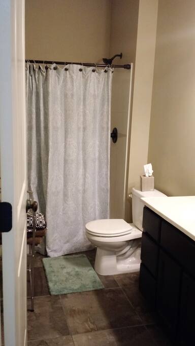 Private bathroom with shower.