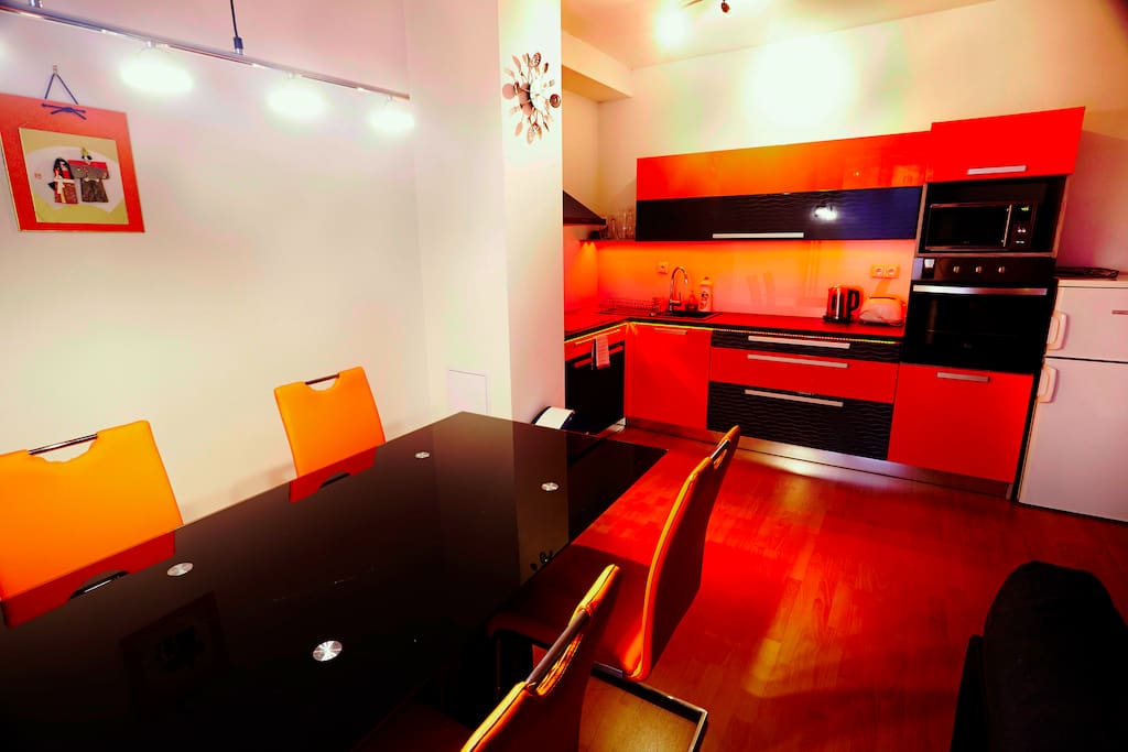 Large glass dinning table and full equipped kitchen