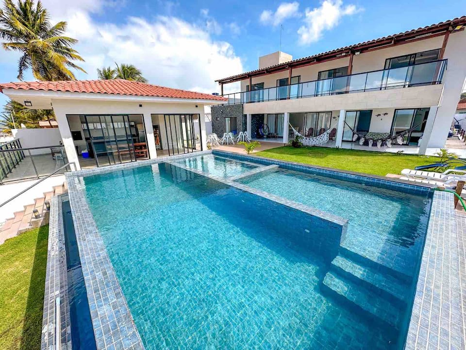 Top-earning Airbnb listing in Pitimbu, 7 bedrooms