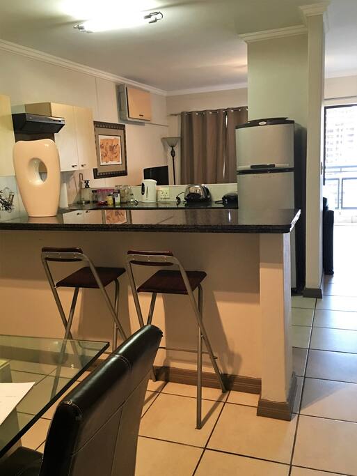 Open plan living with granite counter top
