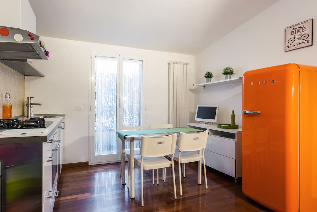 The equipped Kitchen - The colorful fridge & The dining table
