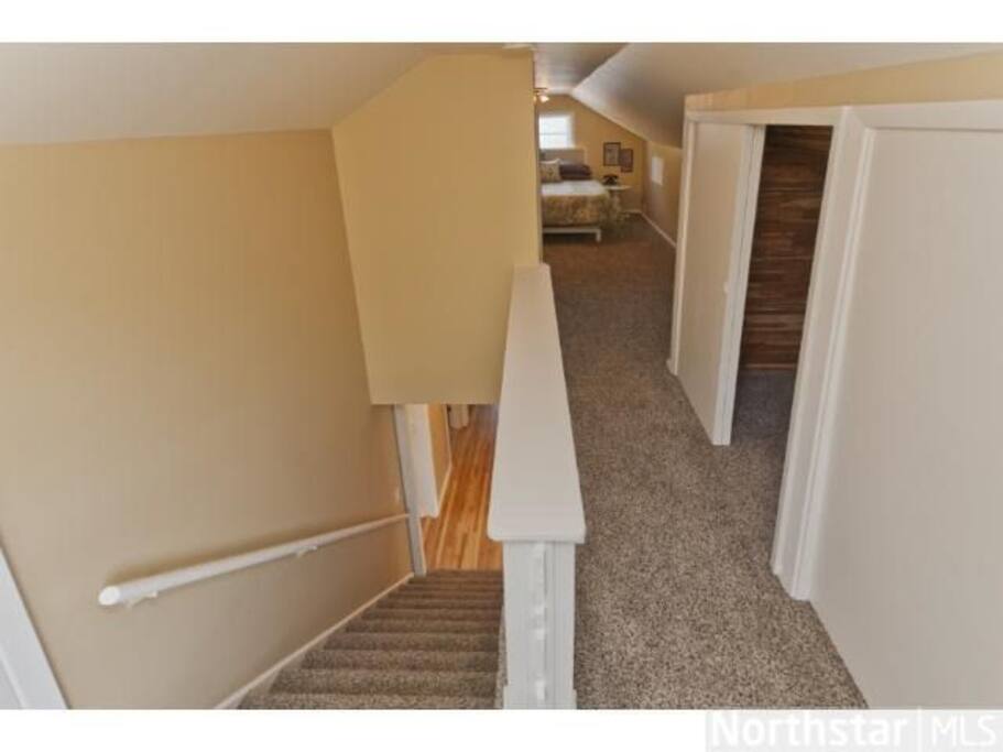 Upper level is a dedicated bedroom with a king size bed.