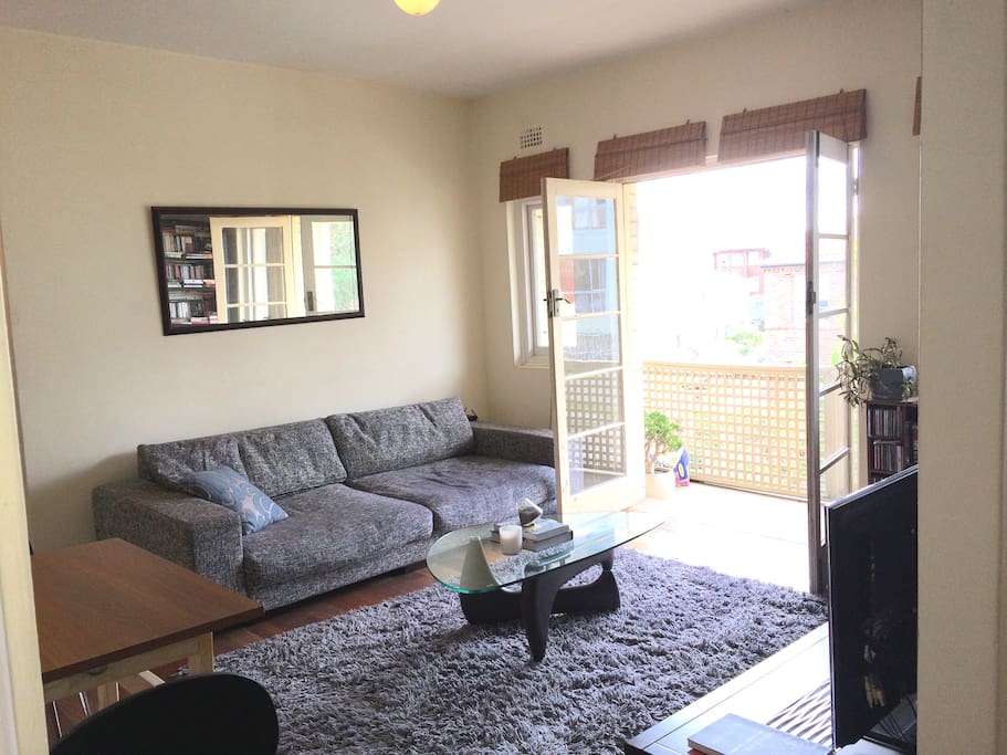 3 seater sofa and balcony to enjoy breakfast or cocktails on.