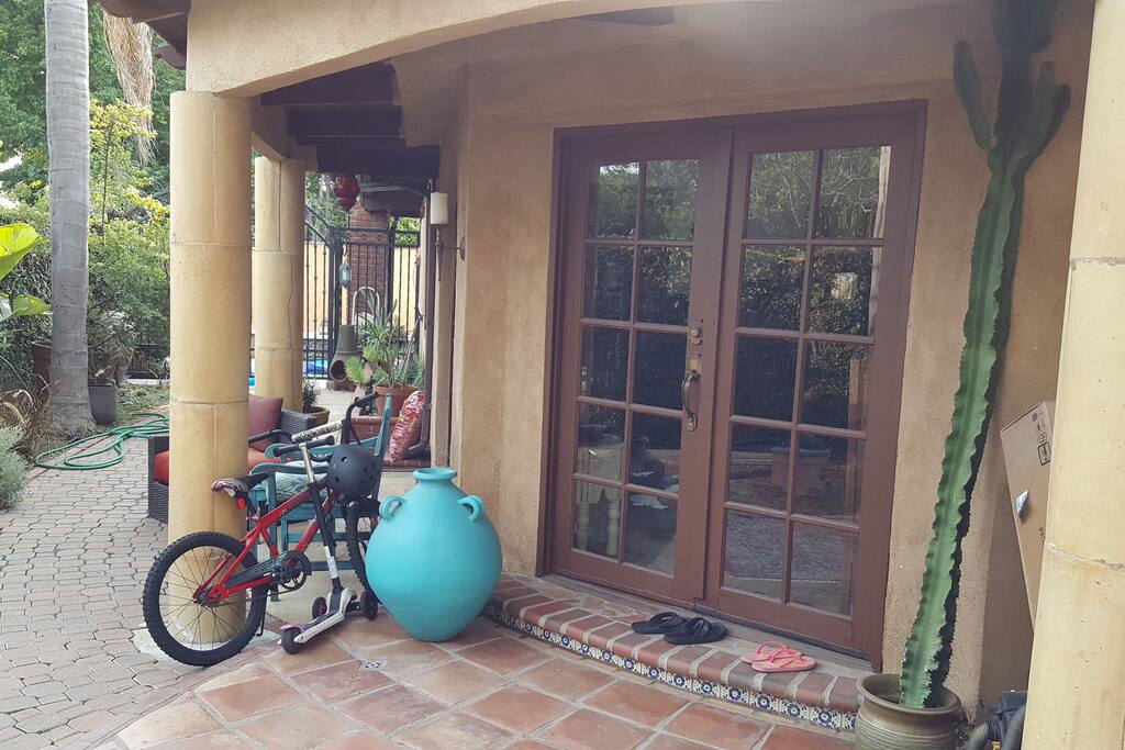 Front doors to home inside front courtyard