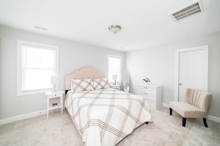 Upstairs Bedroom #2: queen bed, closet, dresser, & chair