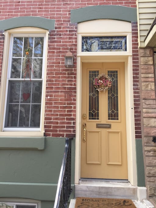Front door with custom stained glass transom.
