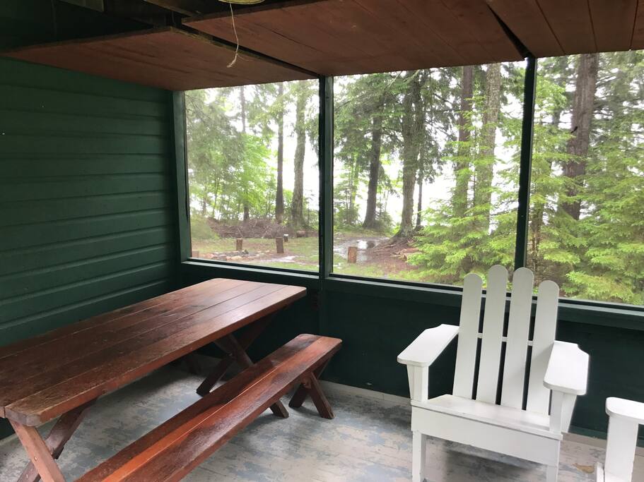 Screened in porch overlooking the lake