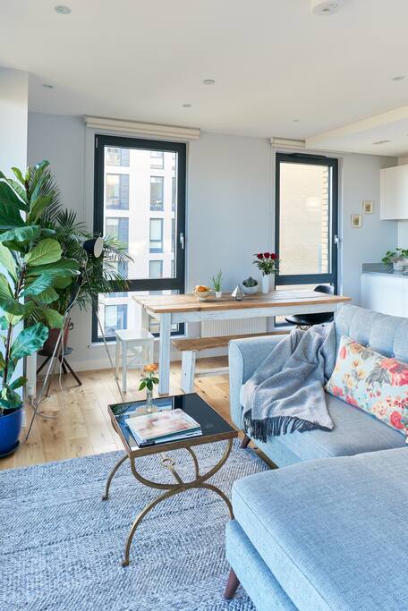Relax on the large comfy sofa with views of the canal