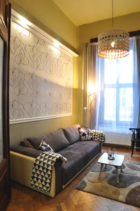 Living room over the looks the street, plenty of sunlight
