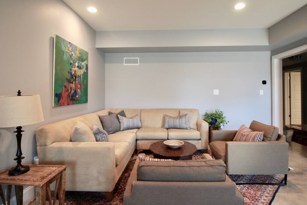 Just inside the entry door, the sofa seating provides lovely views of the garden