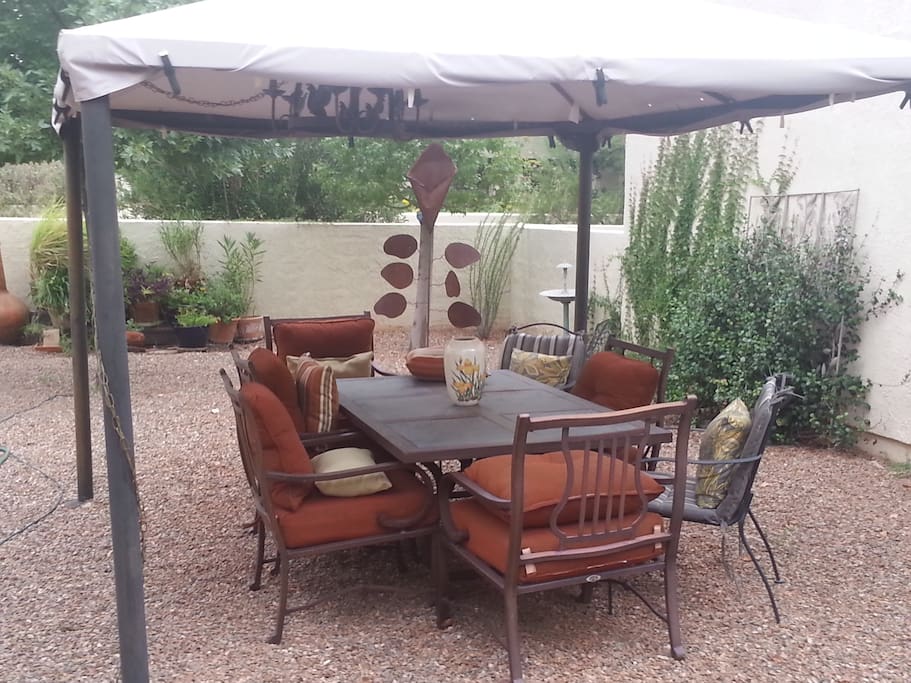 Outdoor dining under the gazebo