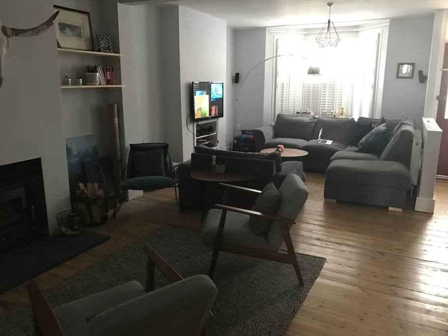 TV Area on one side, Reading and Fireplace on the other