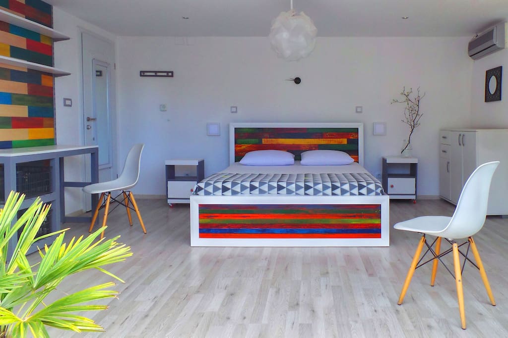 Private room (Room A: ~20m2) with balcony. 2-person (queen size) bed (~1.5x2m).