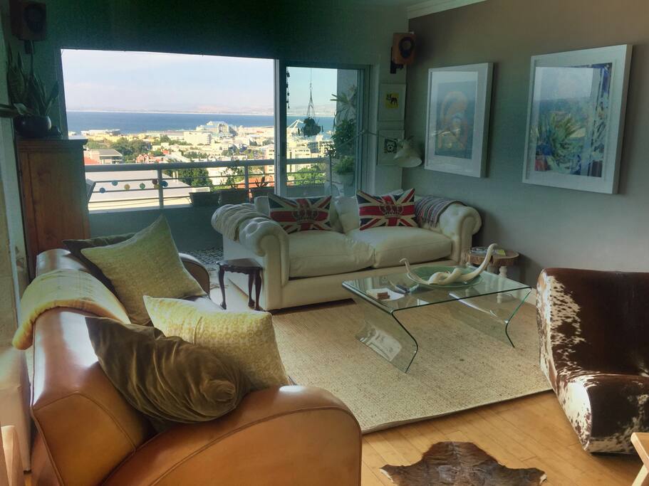 Lounge, overlooking the V&A Waterfront, opening onto small balcony.