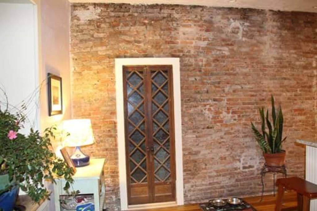 Kitchen leading into original Kitchen/Brick Oven Room