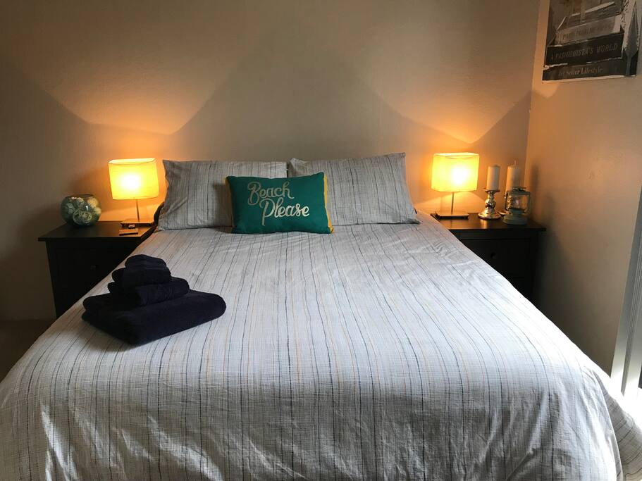 Queen sized bed with a Sealy Posteurpedic Mattress for a wonderful night's sleep.