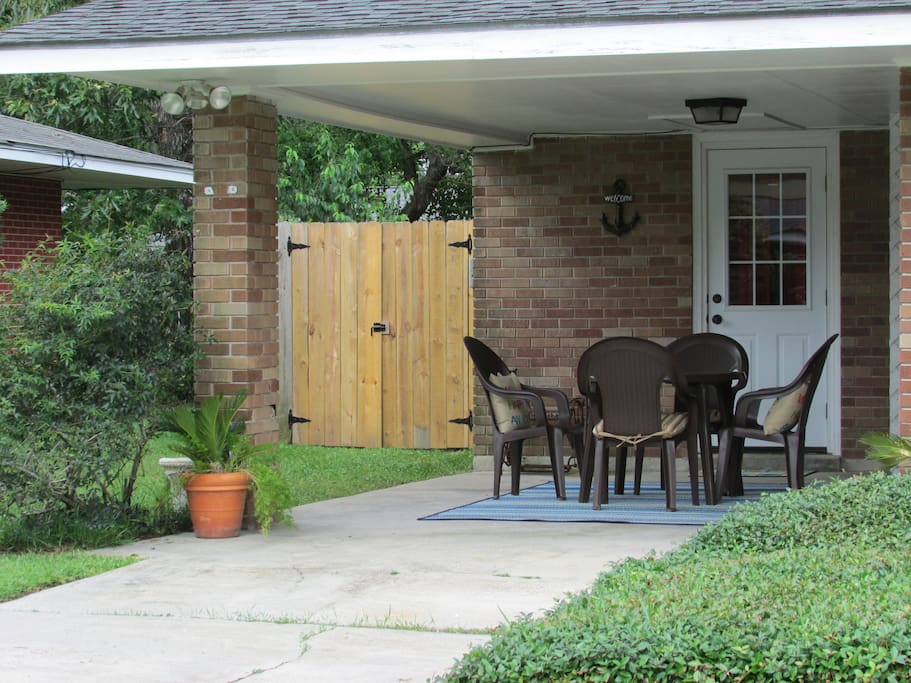 Outdoor seating in front of home to relax and visit.