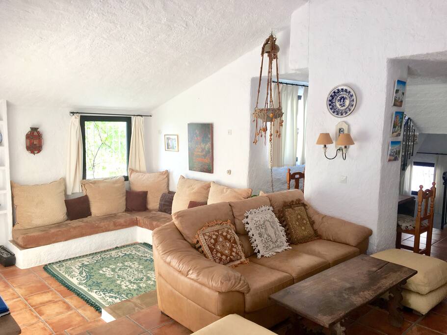 Split living area that has a flatscreen TV and DVD player